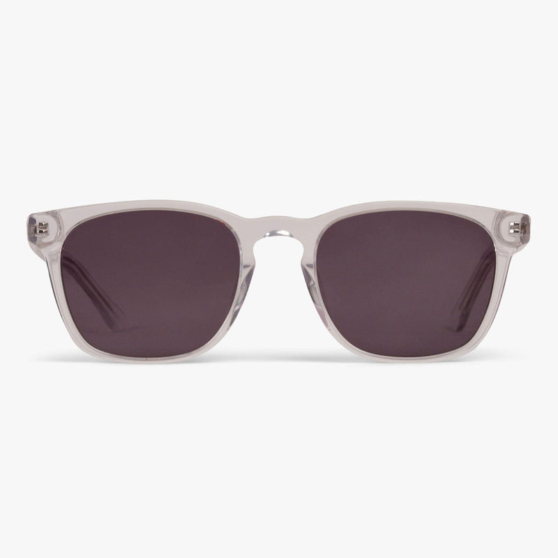 Sunglasses with transparent crystal frame and dark lenses
