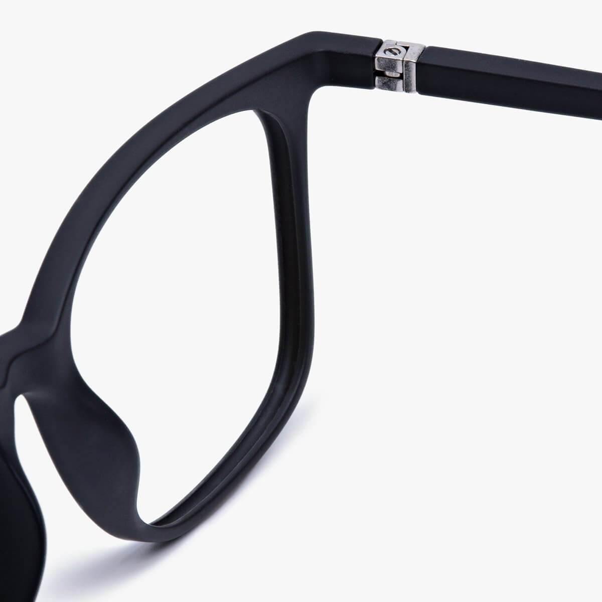 Close-up of Fyn Black glasses with matte black frame