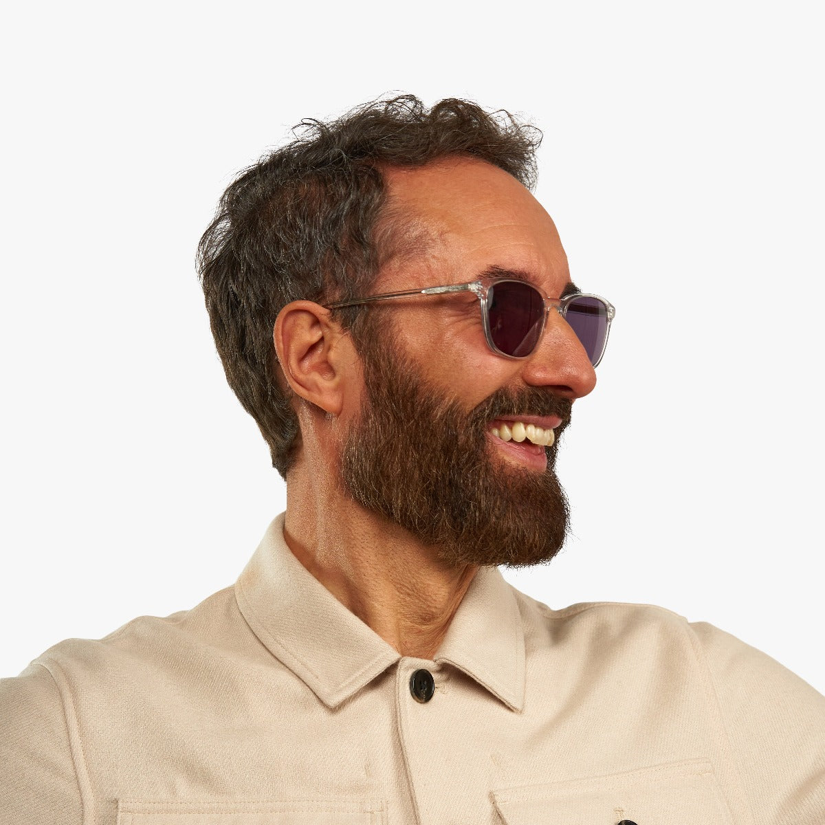 Person wearing Men's Ebeltoft Crystal White glasses