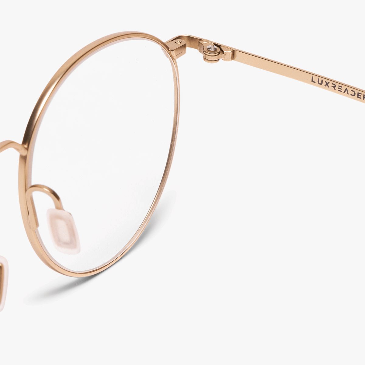 Round gold reading glasses with crystal rims and Luxreaders branding
