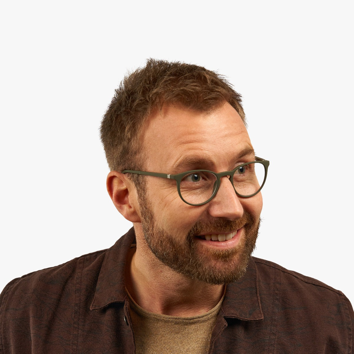 Person wearing Stockholm Dark Army glasses with dark green frames