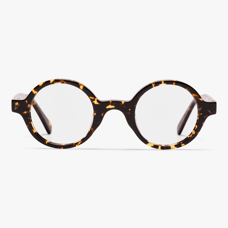 Round tortoiseshell reading glasses with a dark frame