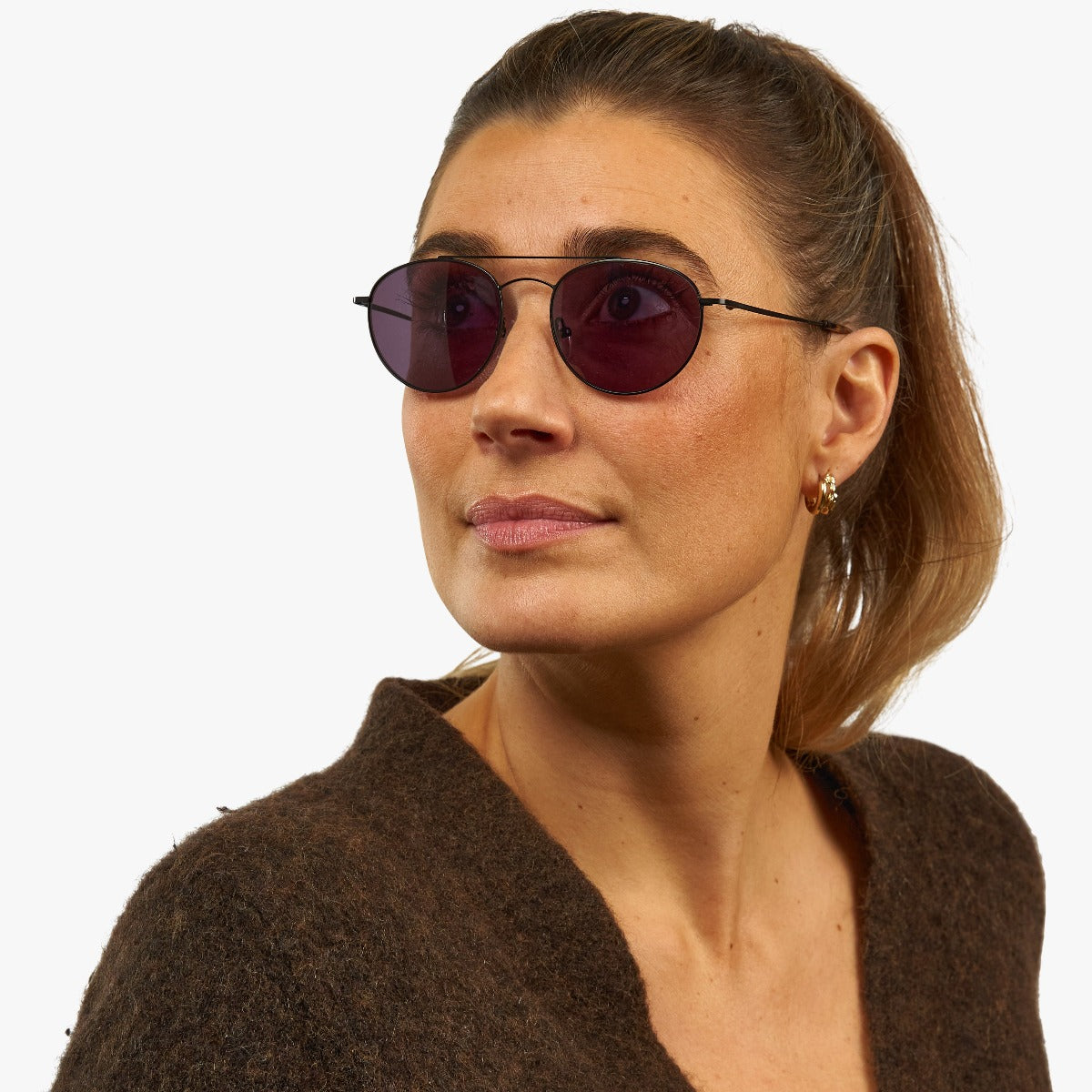womens-goteborg-black_sunglasses_female-model-1.jpg?v=1771416676&width=2597