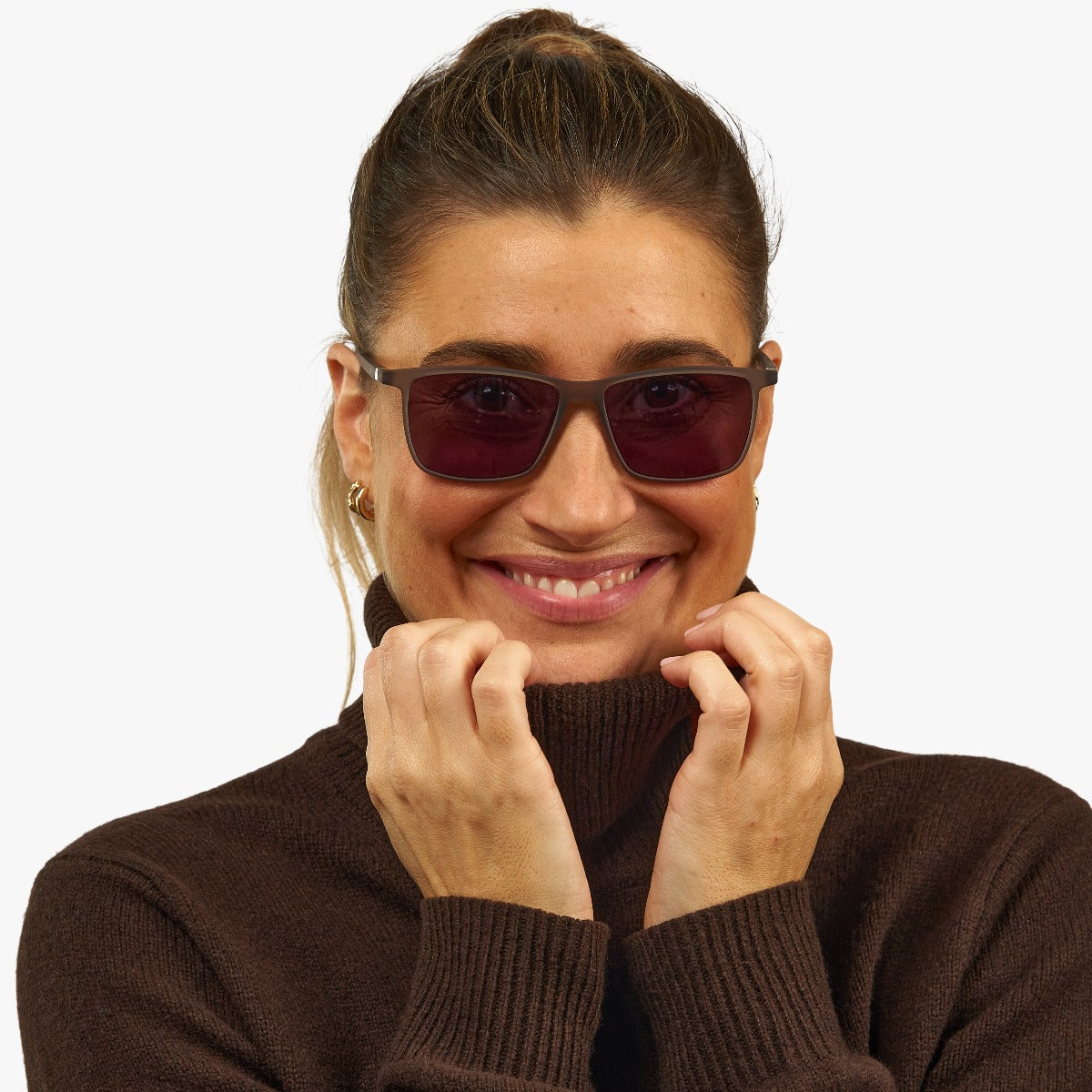 Person wearing square grey sunglasses