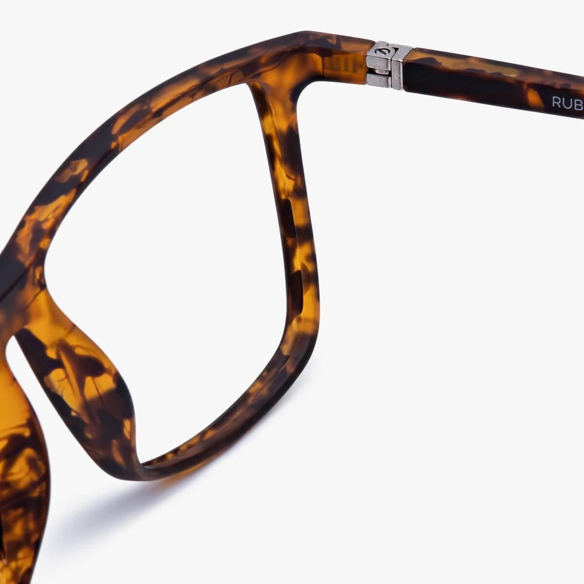 Tortoise shell frame glasses with metal hinge detail