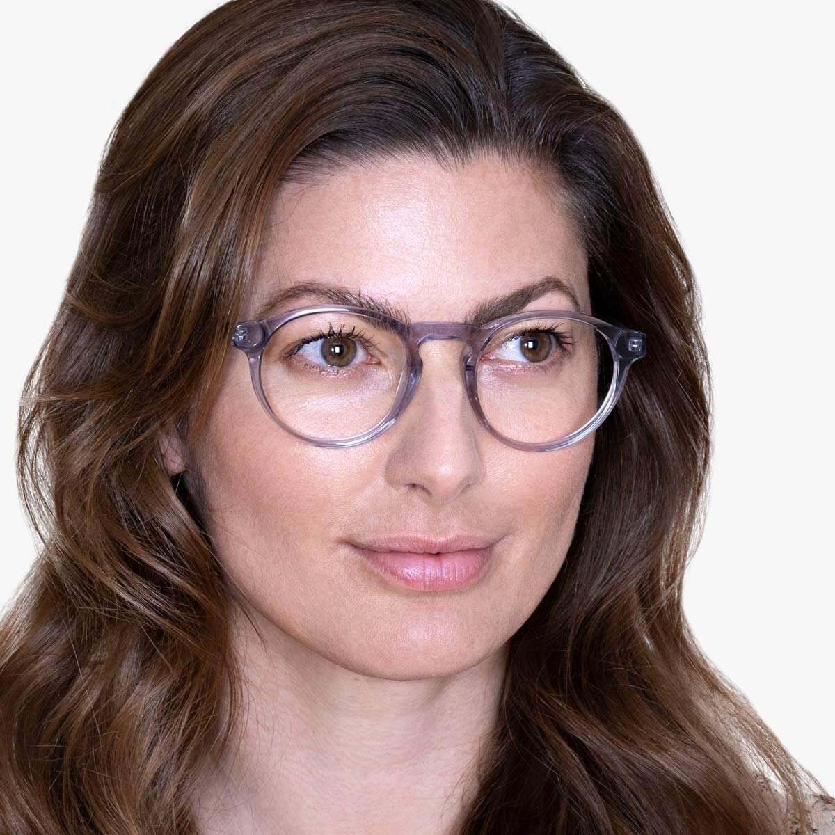 Person wearing Women's Trondheim Crystal Grey glasses